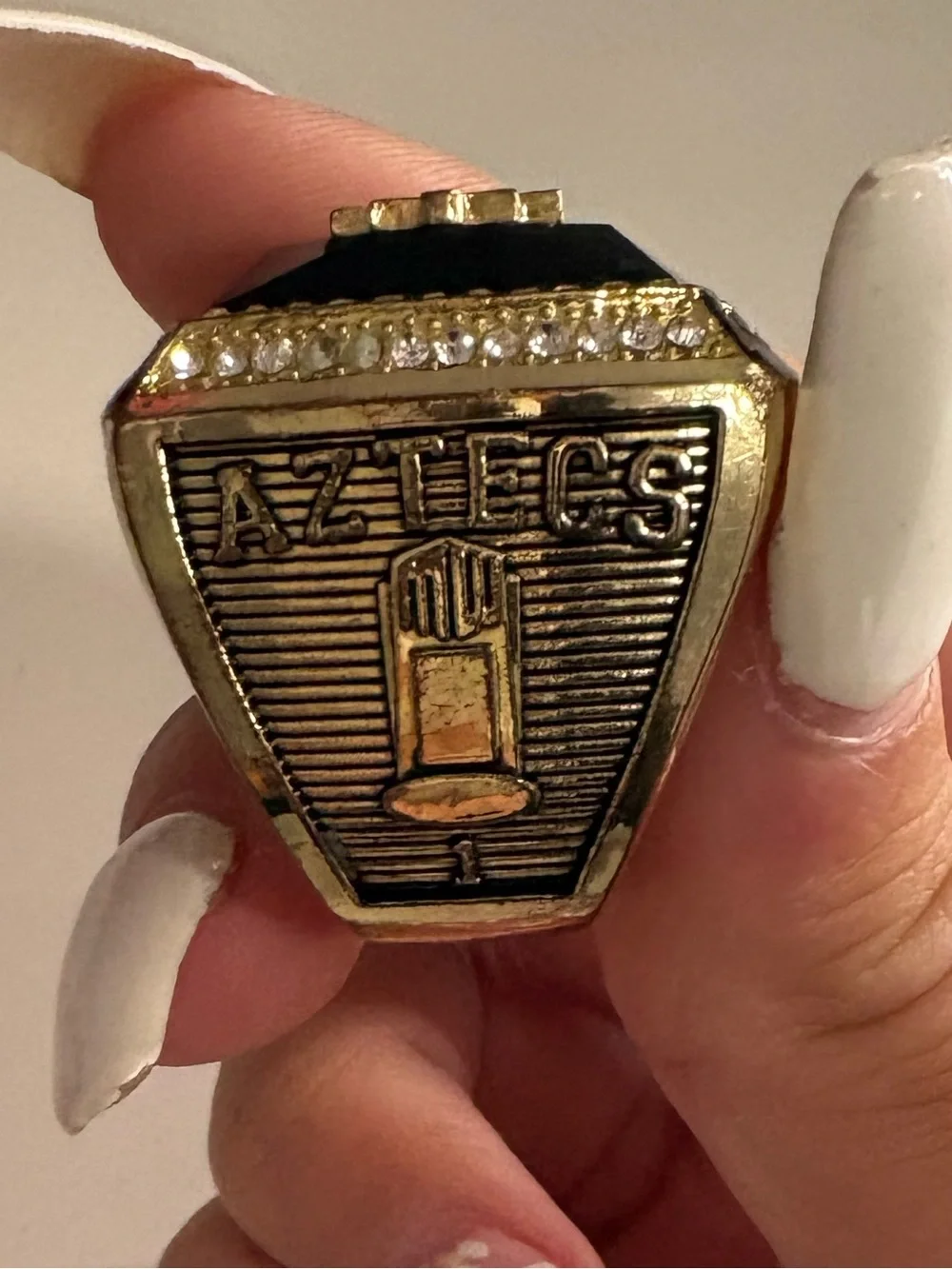 Mountain West Champions Ring with Red and Black Logo
